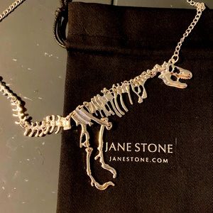 Brand new Jane stone dinosaur necklace, silver.